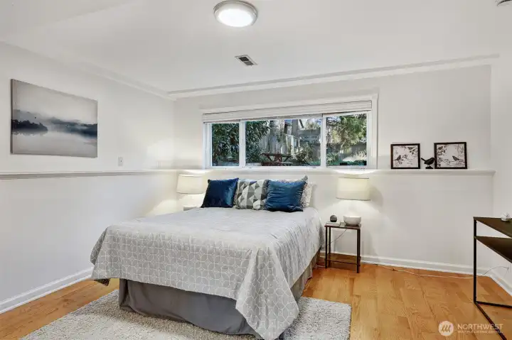 Spacious lower-level bedroom.