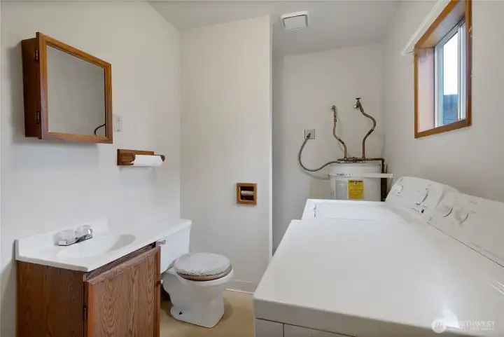 Half bath and laundry room off the Den/ Rec Room