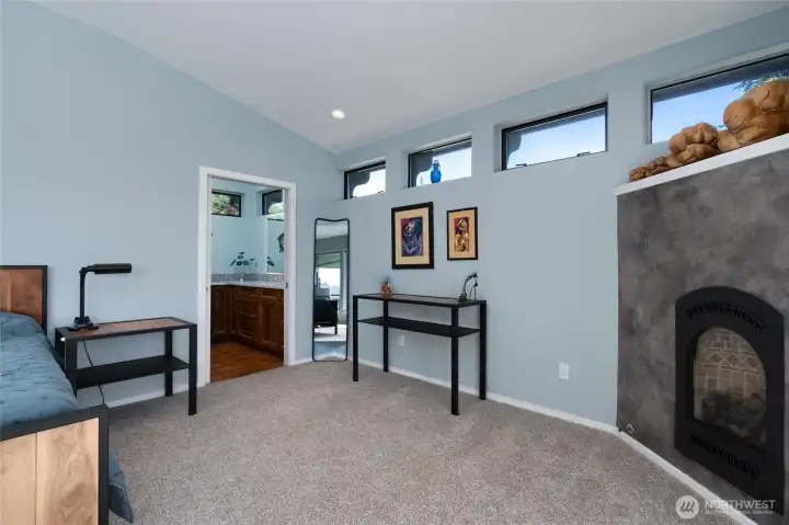 Large Primary Bedroom with Fireplace leads to Full Primary Ensuite