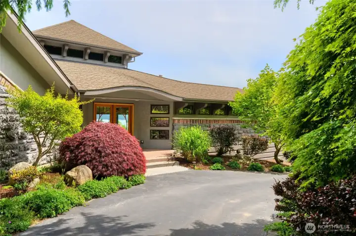 Lush landscaping provides privacy from street