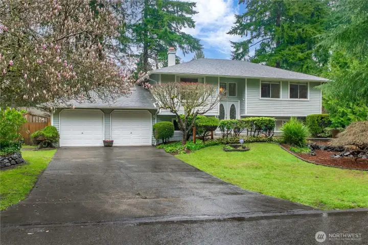 Plenty of room to park in the 2-car garage and the driveway.