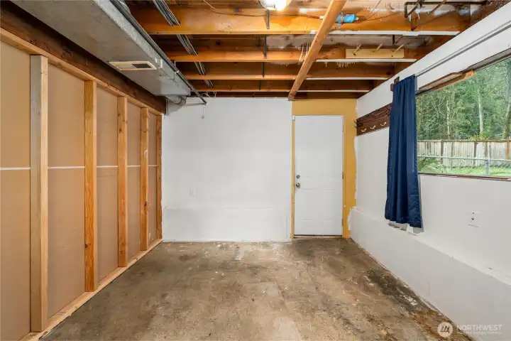 Same room- different angle - that is the door to the 2-car garage.