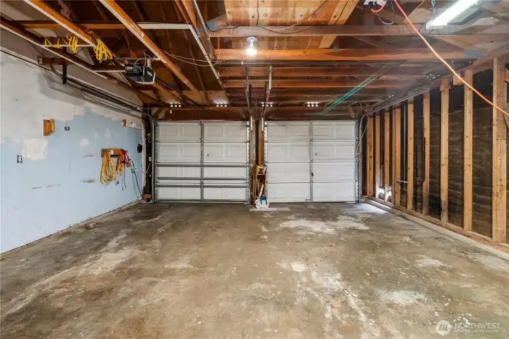 480 sf garage has plenty of room for vehicles and workspace.