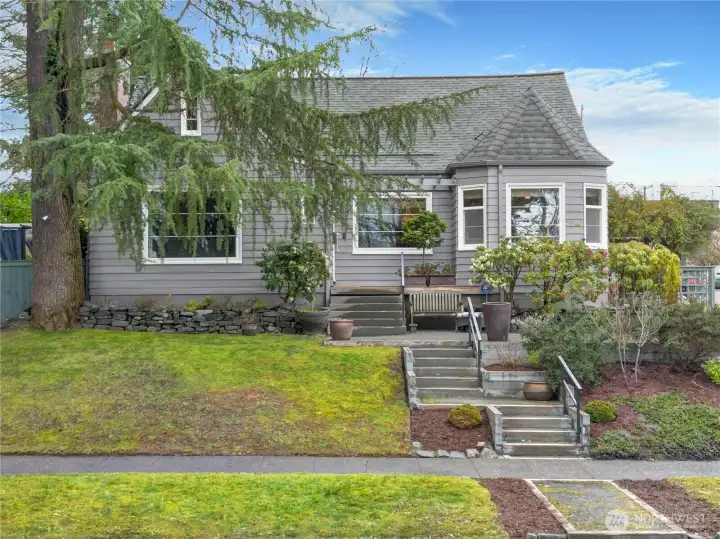 This versatile charmer is ideally positioned just blocks from the University of Puget Sound and North Tacoma’s historic Proctor District—home to beloved markets, cafés, and local shops. Fresh 2025 exterior paint, established landscaping, and timeless architectural details create a warm and welcoming first impression, complemented by major updates including a newer roof (2023), furnace (2024), and updated windows.