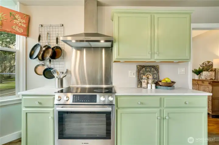 Thoughtfully updated with new cabinetry and countertops (2021) plus a sleek electric Bosch range (2020)—blending style and everyday function.