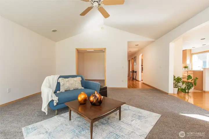 living room with separate den/office