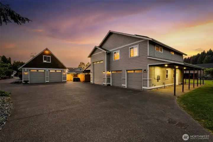 Two separate detached garage buildings, One featuring 2 ADU's, an 880 sq. ft. ADU with 1 bedroom, 1 bath, and a walk-in closet. A second 880 sq. ft. ADU offers 2 bedrooms and a 3/4 bath.