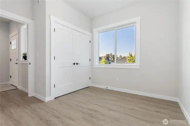 Office or bedroom located just inside the front entry.
