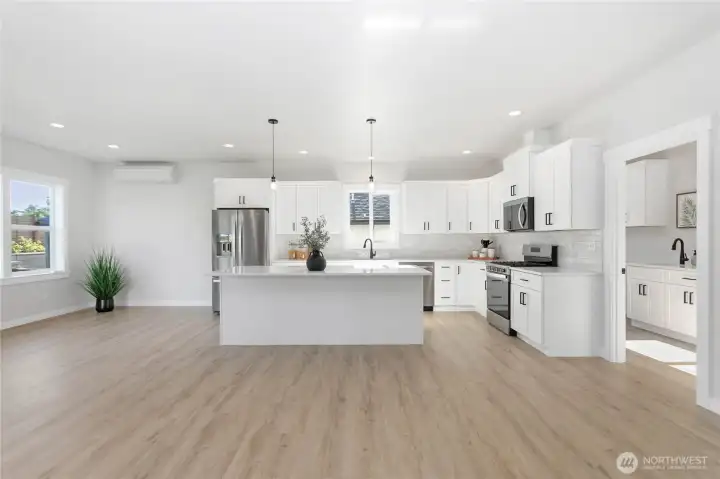 The Utility room is conveniently located off of the kitchen and leads to the garage.