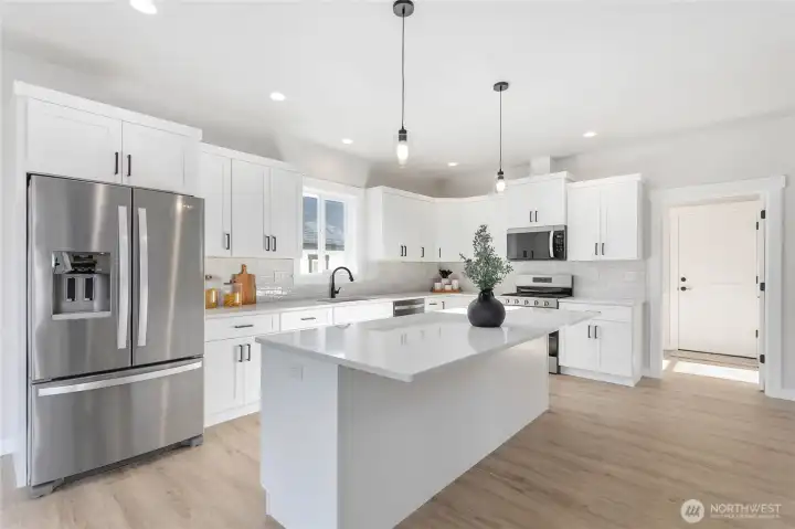 The open door leads to the utility room and the garage.