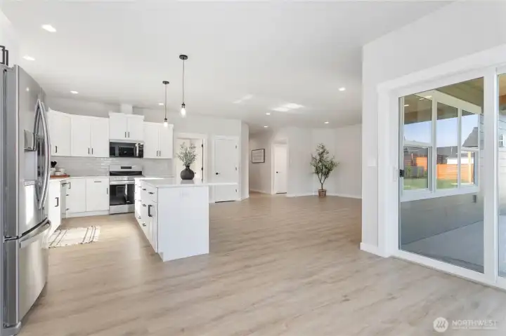 There is easy access to the covered back patio and backyard.