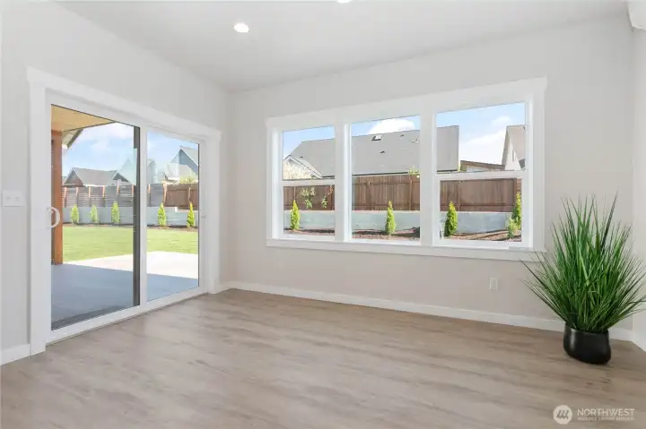 Large window and spacious dinning area.
