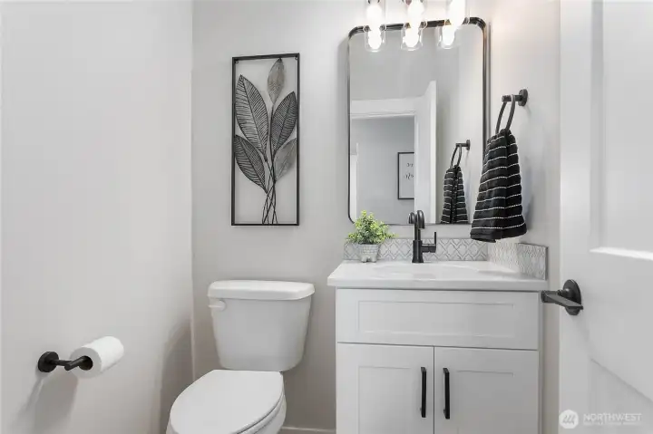 Half bath located downstairs.