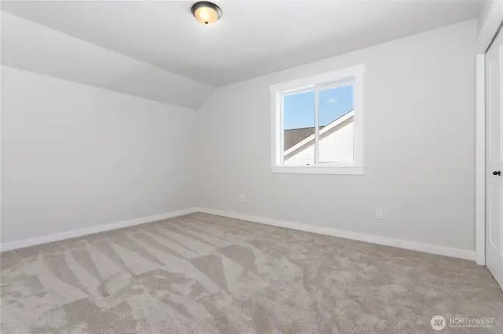 Bedroom #3 located upstairs.