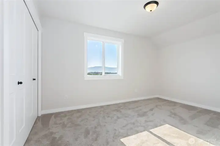 Bedroom #4 located upstairs has a great view.