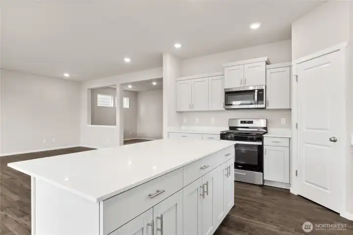 Gourmet kitchen viewed from the island. Photos are representative only and may display different color packages and/or upgrades.