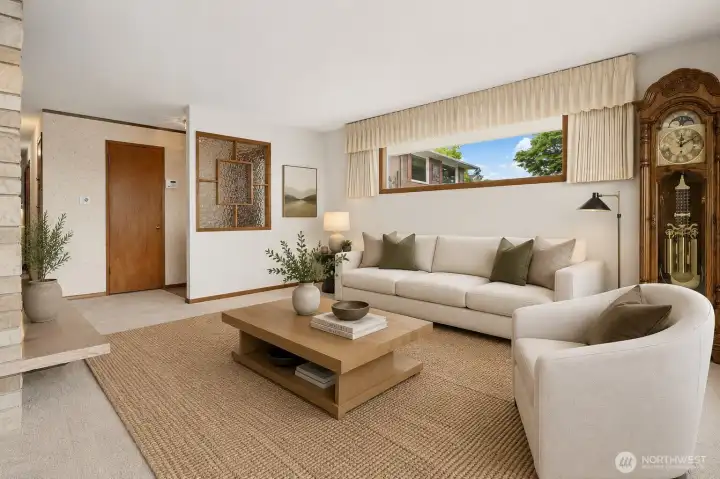 Living space framed by view windows.