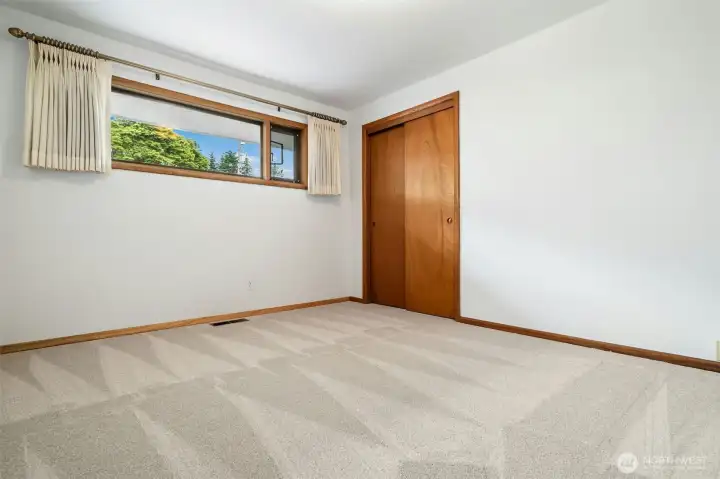 Bedroom with privacy window.