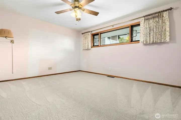 Another bedroom, also with privacy window.