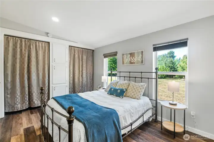 Split floor plan provides privacy for the primary bedroom.