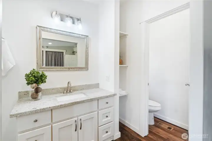Primary bathroom with toilet room