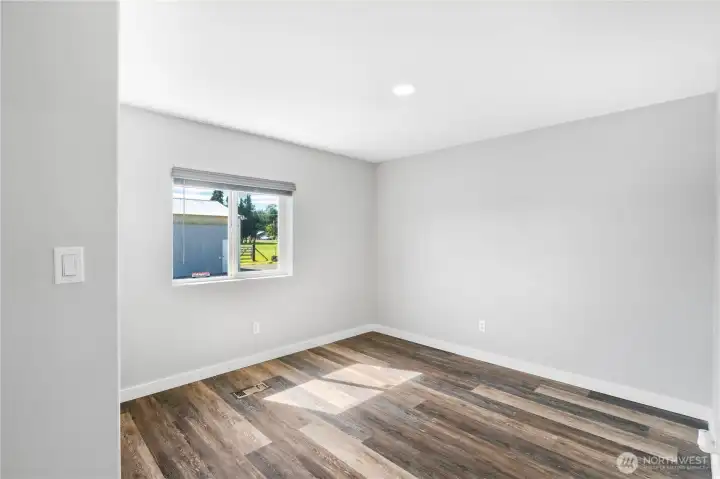 Bedroom 3 includes LVP and can lighting