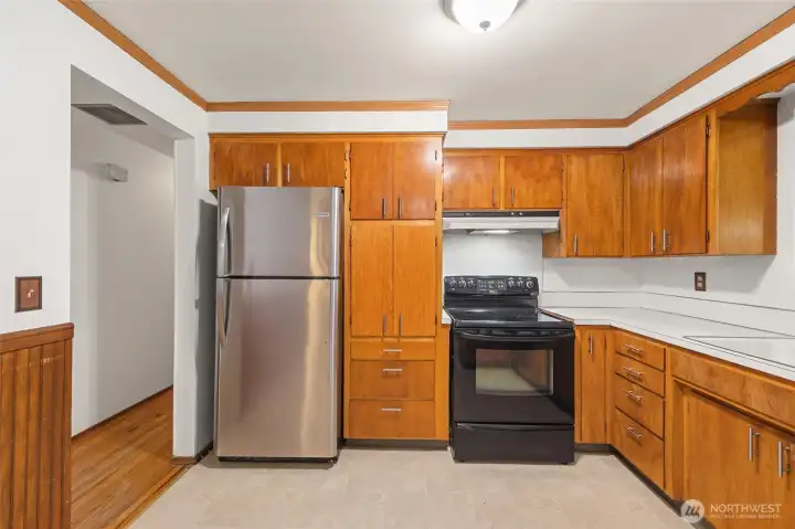 Ample cabinetry and storage keep everything within reach.