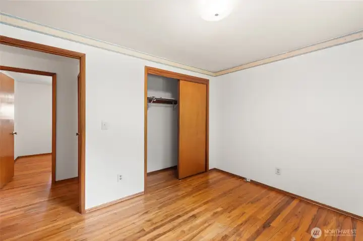 Spacious primary bedroom offers a peaceful retreat at the end of the day.