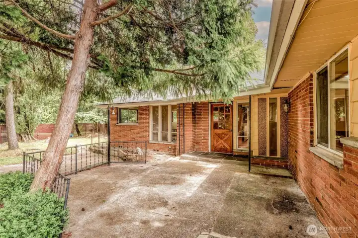 Mature landscaping provides a welcoming backdrop.