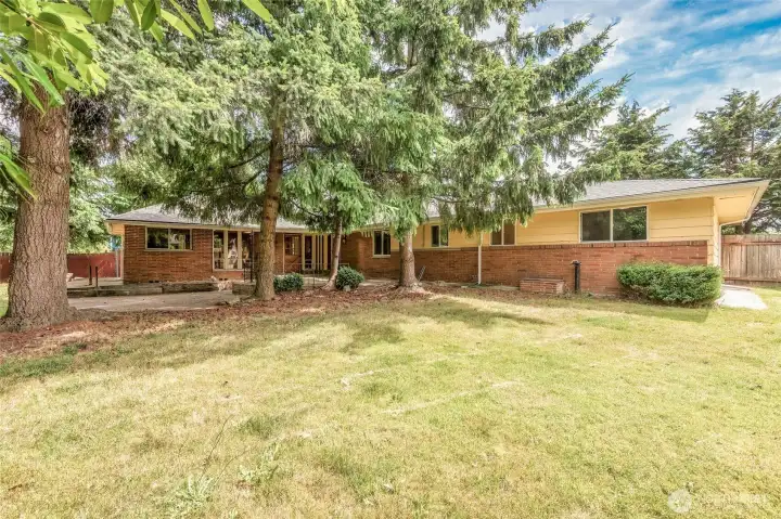 Level backyard perfect for outdoor enjoyment. Perhaps an ADU...