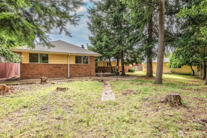 Fully fenced yard offers privacy and security.