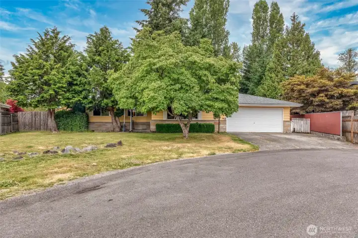 Nestled on a quiet cul-de-sac in an established neighborhood.  A spacious .27-acre lot with room to grow.