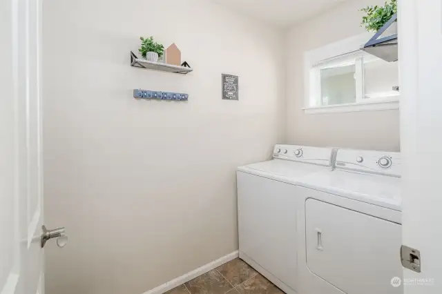 Separate Laundry Room space makes laundry a breeze. Washer and Dryer convey.