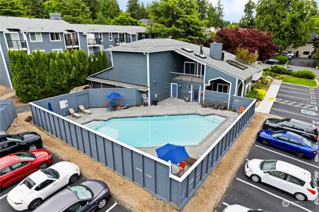 Outdoor pool to enjoy on those warm summer days, right across parking lot from the building.