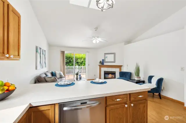 Breakfast bar seating is available on the kitchen peninsula, and a handy outlet is right on the end for charging your devices.