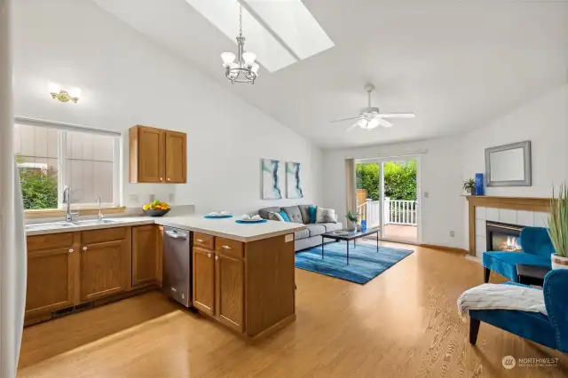 The family room and kitchen are flooded with natural light thanks to the skylights, and the open “great room” concept offers easy flow for entertaining.