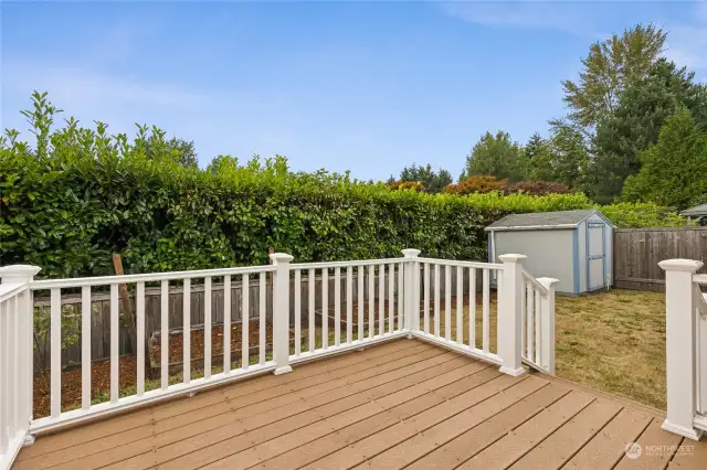 The hedge behind the home creates a lush green privacy divider between the backyard and your neighbor, providing a great buffer.