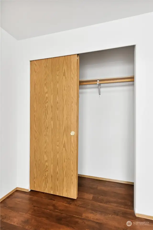 Each bedroom has a closet with sliding doors and shelf, ready to be customized for your own storage needs.