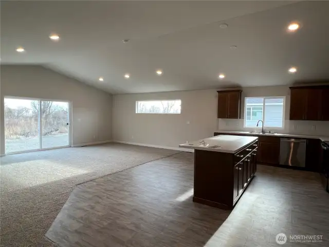 Kitchen and patio off living room
