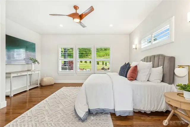 New plantation shutters and mounted TV convey
