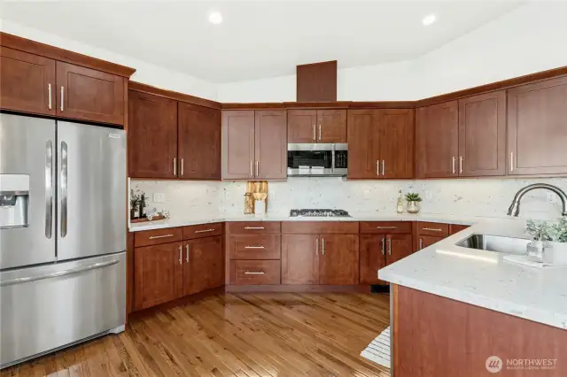 A spacious gourmet kitchen with p