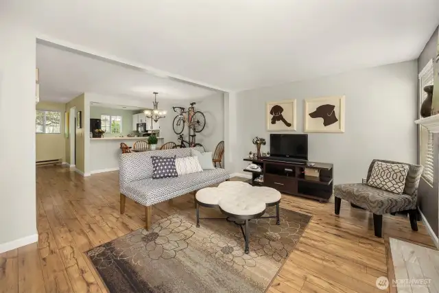 Once inside, the entry flows smoothly into a central hallway, guiding you through the home.