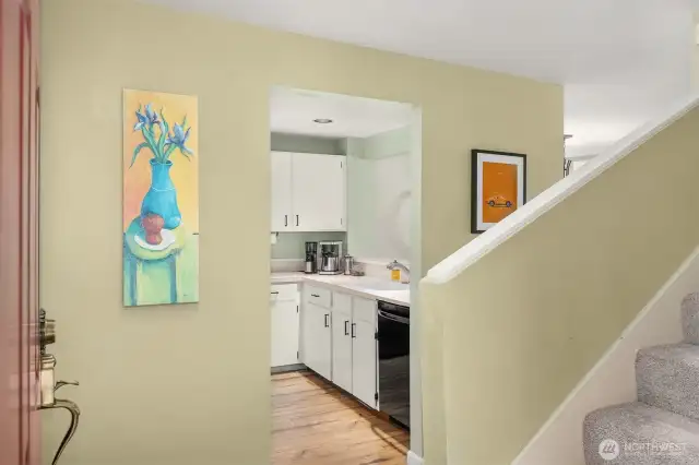 Wall space is ideal for hanging family photos, artwork, or a stylish mirror to open up the space.