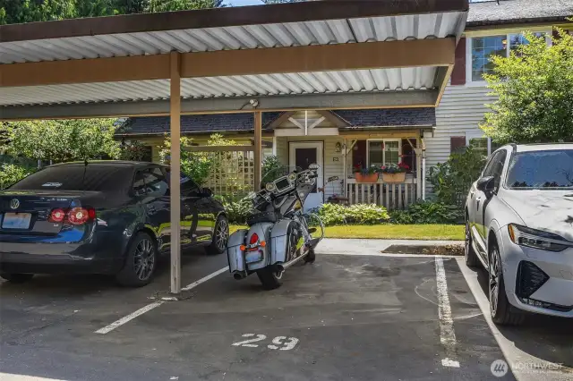 Assigned covered parking spot just steps from your front door ensures convenience and protection from the elements. 1