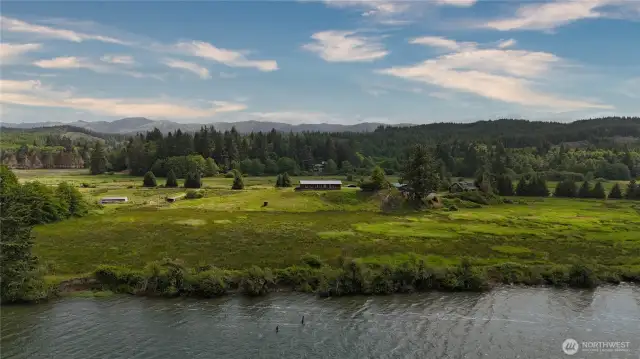 Home sweet home with 835+ feet o river frontage.