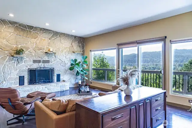 Step outside to the full length deck spanning the entire back of the home.