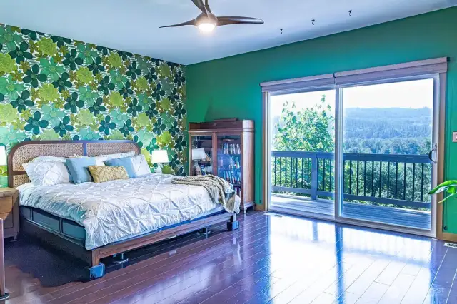 Primary suite with slider to the back deck.