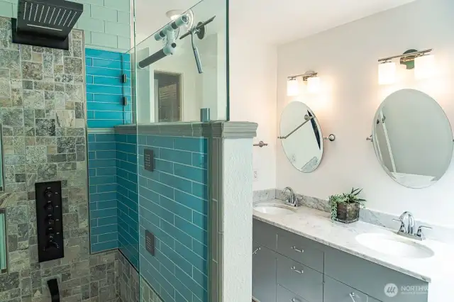 Custom spa-like shower in the primary suite.