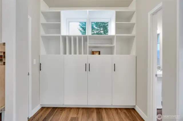 Built-in shelving with cabinets will help keep your home organized.