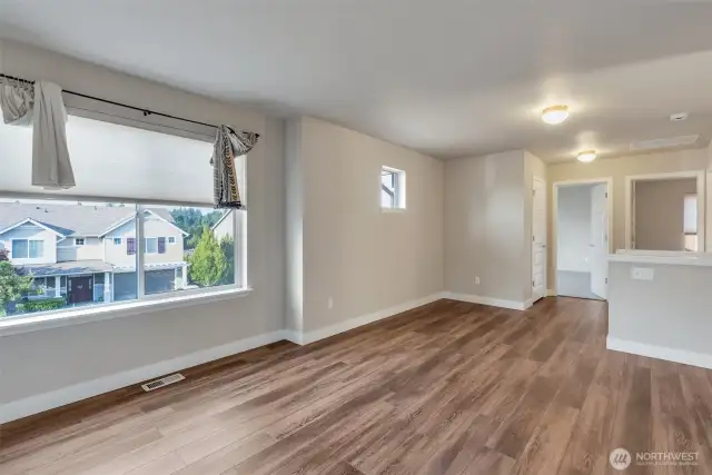 The upper level offers a large loft area perfect for home office, fitness area or whatever your needs.